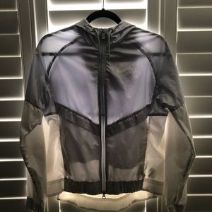 NIKE WINDBREAKER GREY AND WHITE